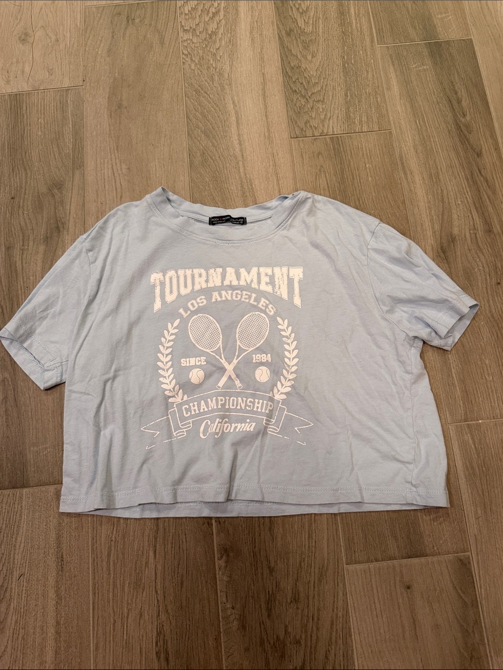 Rock Rose Couture Women’s Light Blue 'Tournament' Graphic Crop Tee Size M